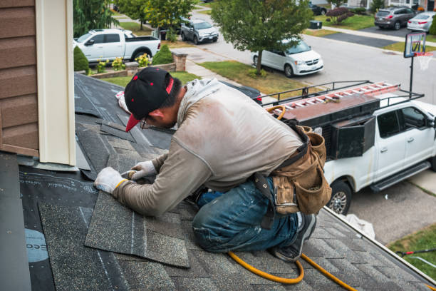 Professional Storm Damage Roof Repair technician working in Chittenango, NY